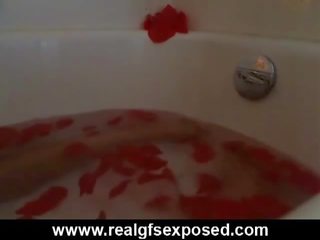Busty brunette rose takes a bath on her webcam